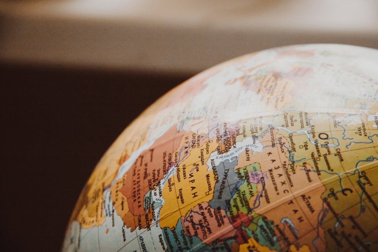 menu-18 Detailed close-up of a globe showcasing parts of Europe and Asia for world exploration concepts.