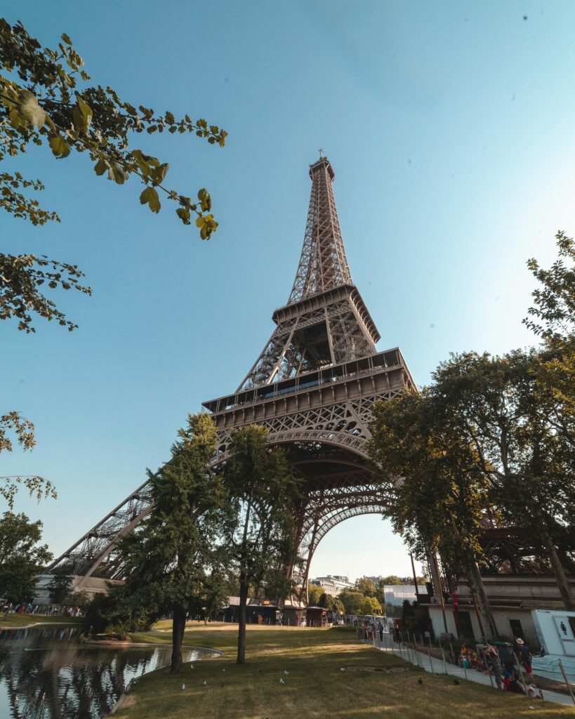 pexels-photo-2728793-2728793 Iconic view of the Eiffel Tower, Paris under a blue sky, ideal for travel inspiration.